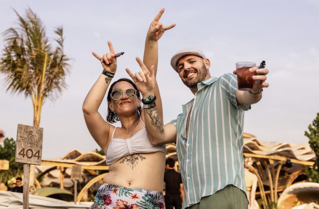 Couple having fun at LUNA Beach Club in Bali.
